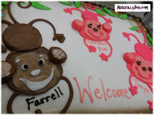 Frosting Monkeys on Welcome Back To Work Cake